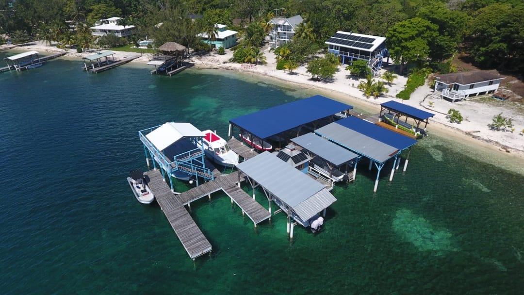 Listing ID: URE0692, The Well Utila, Bay Islands, HN - Covered Boat Slip at The Well, Photo #